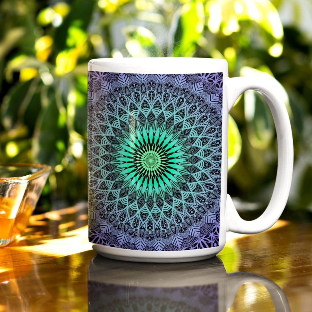 A mintgreen and purple mandala mug with a boho-inspired design, adding an artistic touch to the visual experience.