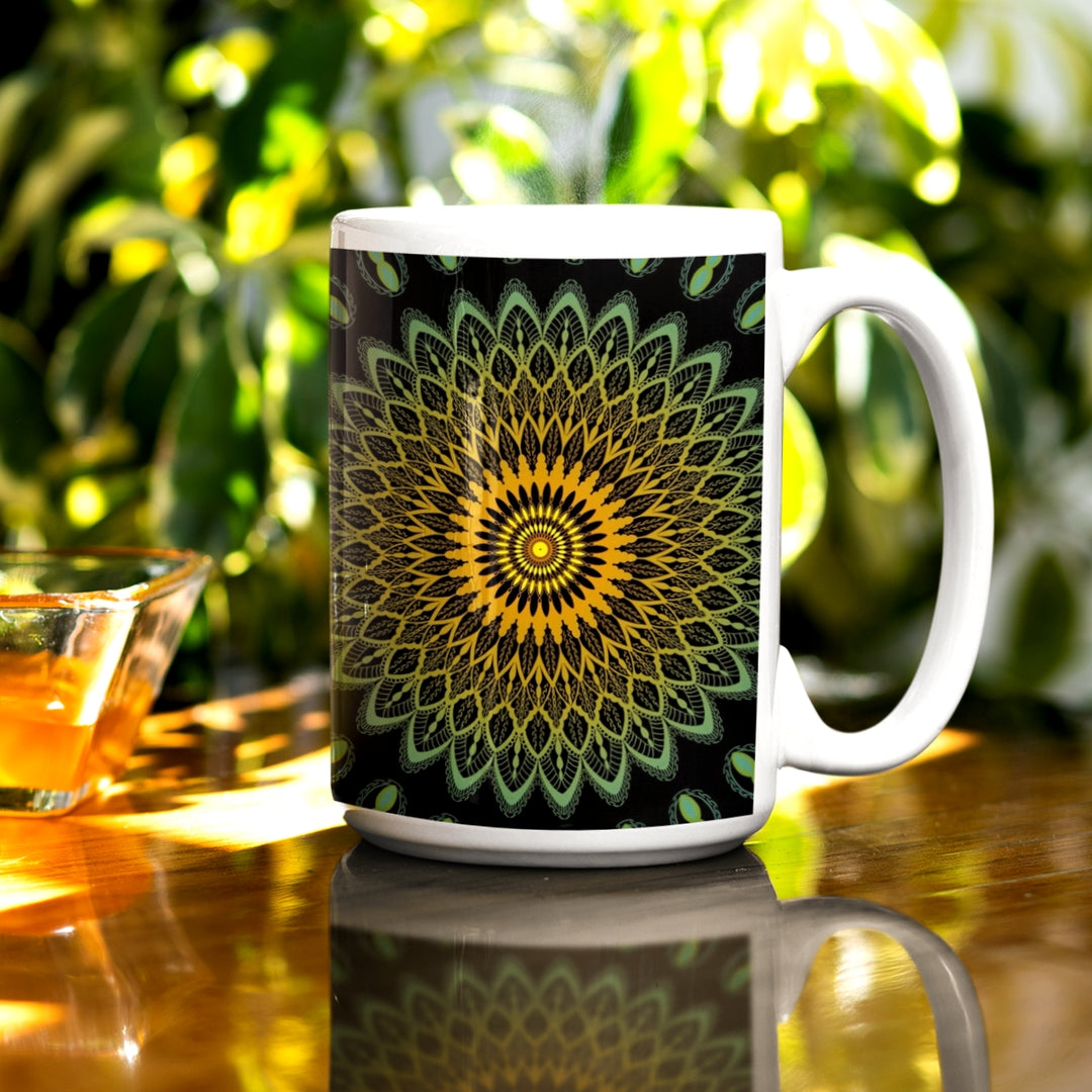 A mandala mug in green and yellow, featuring an intricate design that infuses vibrant elegance into the visual experience.