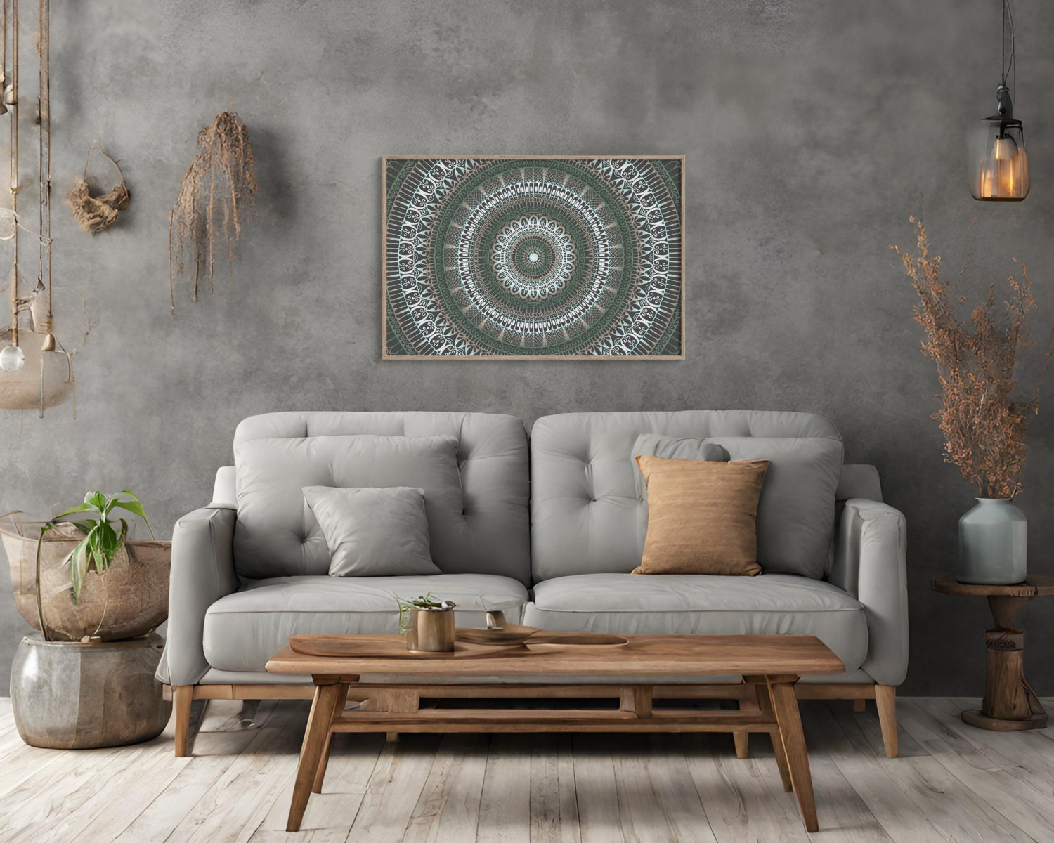 a grey sofa in a boho style room and a poster with a green mandala design on a grey wall