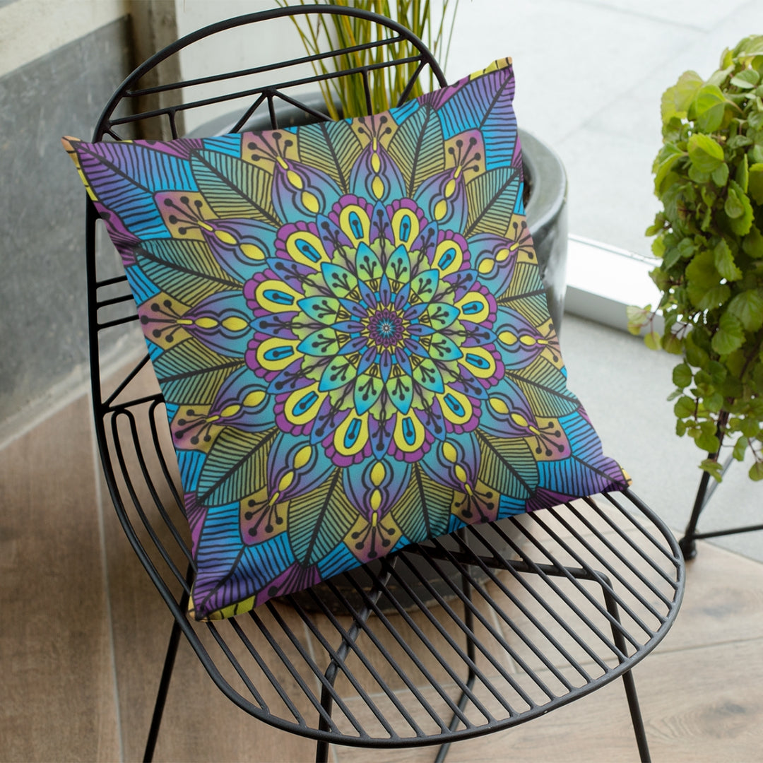 Elevate your home decor with the 'Blossoming Harmony: Flower Mandala Throw Pillow.' The harmonious combination of green, yellow, and purple hues, complemented by the detailed floral mandala, creates an inviting and soothing atmosphere. Place it on your couch or bed to infuse your space with the serenity of a garden in full bloom.