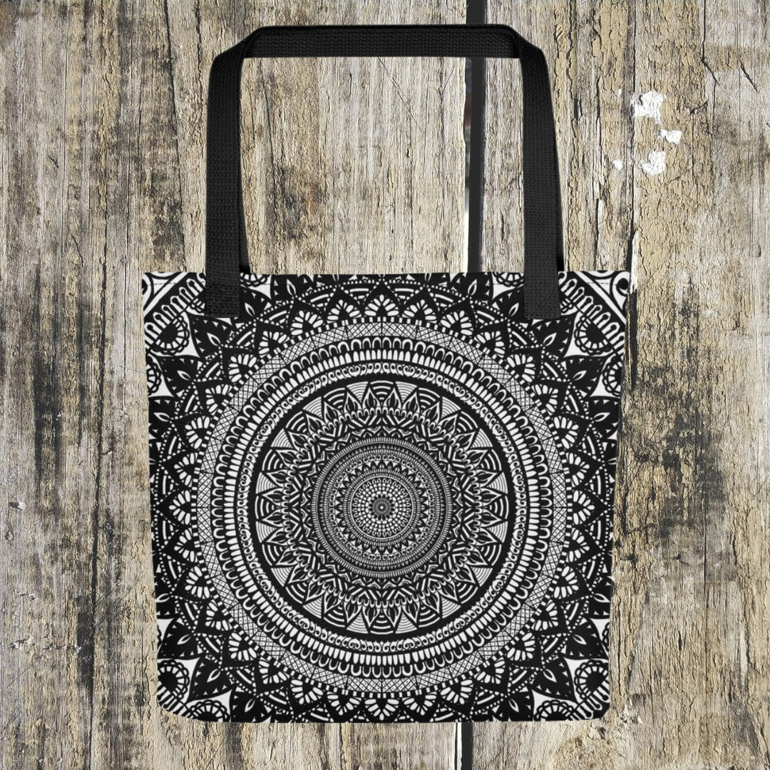A serene grey mandala tote bag named 'Artful Zen: Grey Mandala' with an intricate Mehndi touch, exuding mindfulness and artistic sophistication.