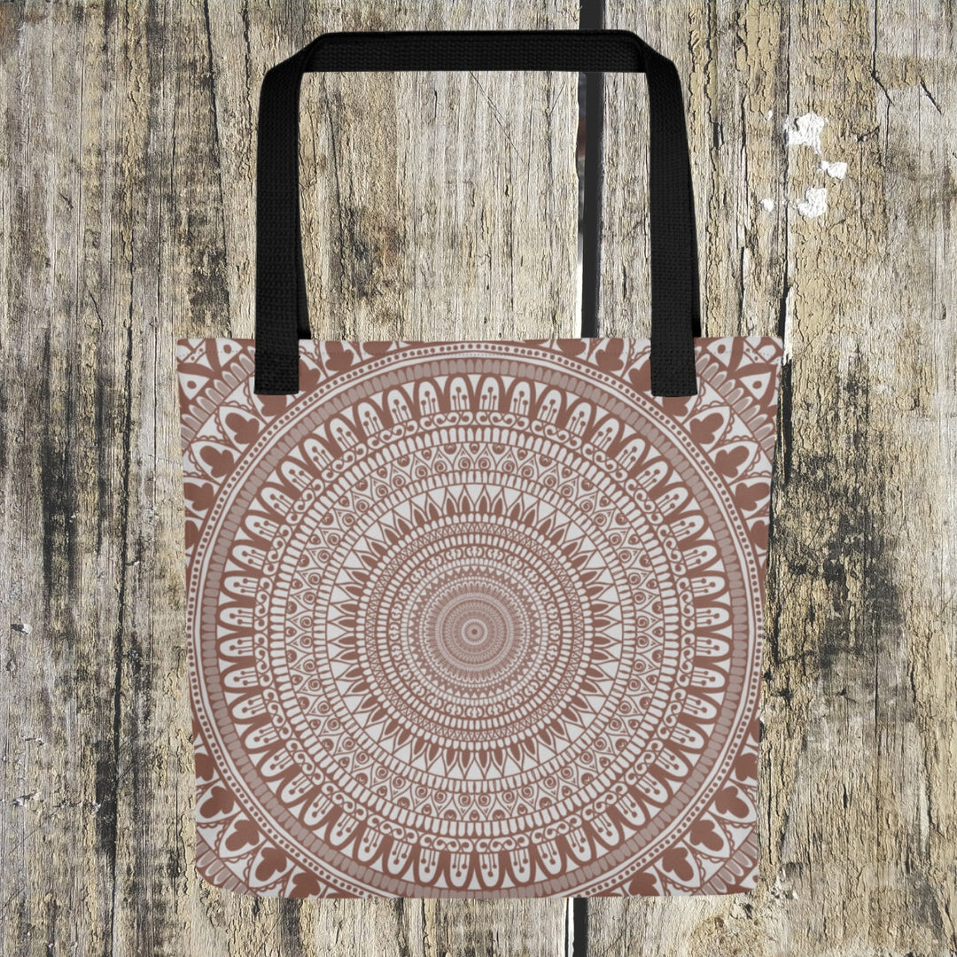  An elegant white mandala tote bag named 'Terracotta Delight: White Mandala' with an intricate Mehndi design, exuding cultural richness and artistic sophistication.