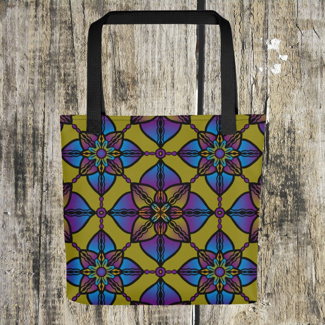 A dynamic and colorful mandala tote bag named 'Vibrant Harmony: Kaleidoscope Mandala,' exuding creativity and artistic expression in Purple, Blue, and Yellow.