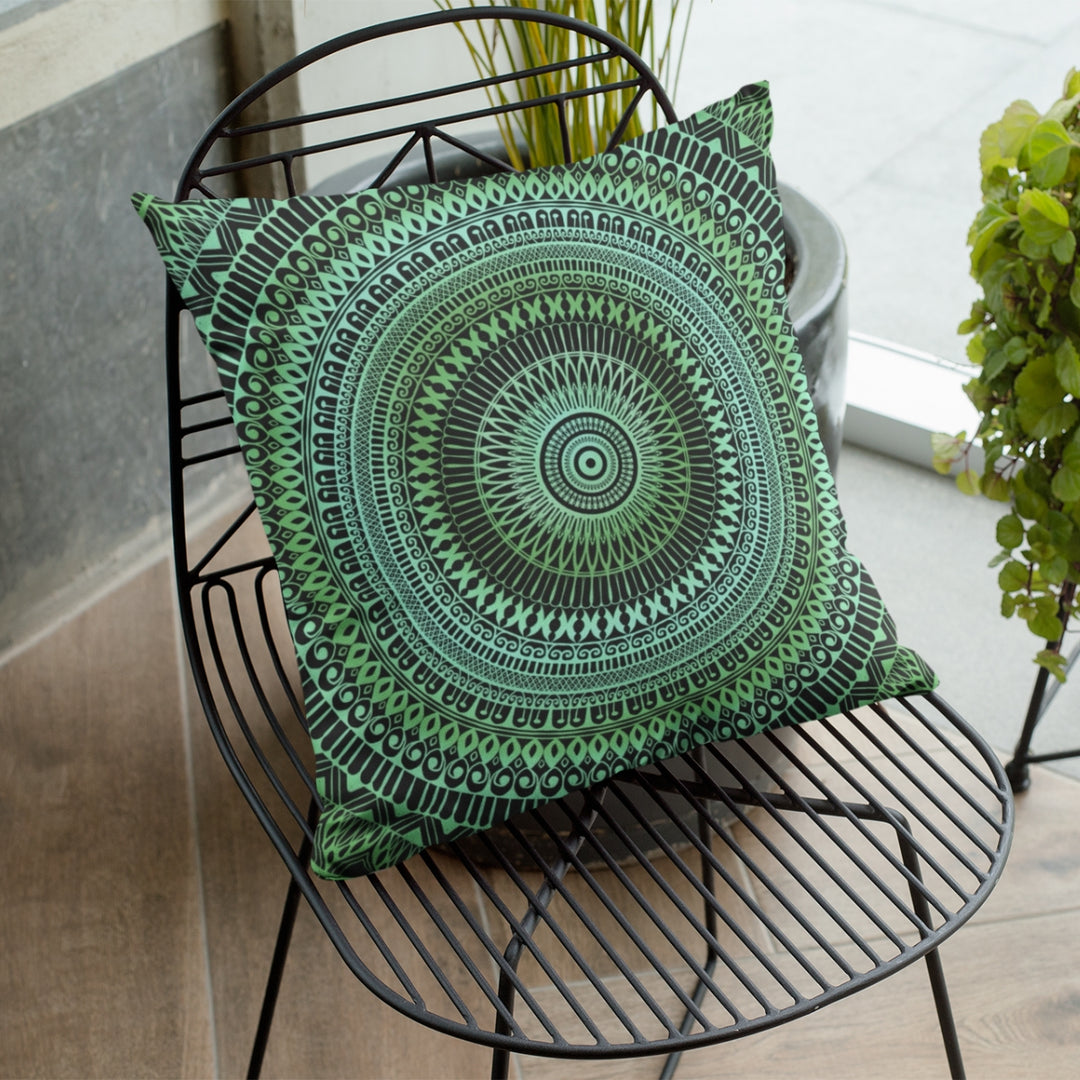 A serene and nature-inspired mandala throw pillow named 'Whispers of Nature: Green & Blue Mandala Throw Pillow,' exuding the calming presence of the natural world and a sense of harmony through its design.