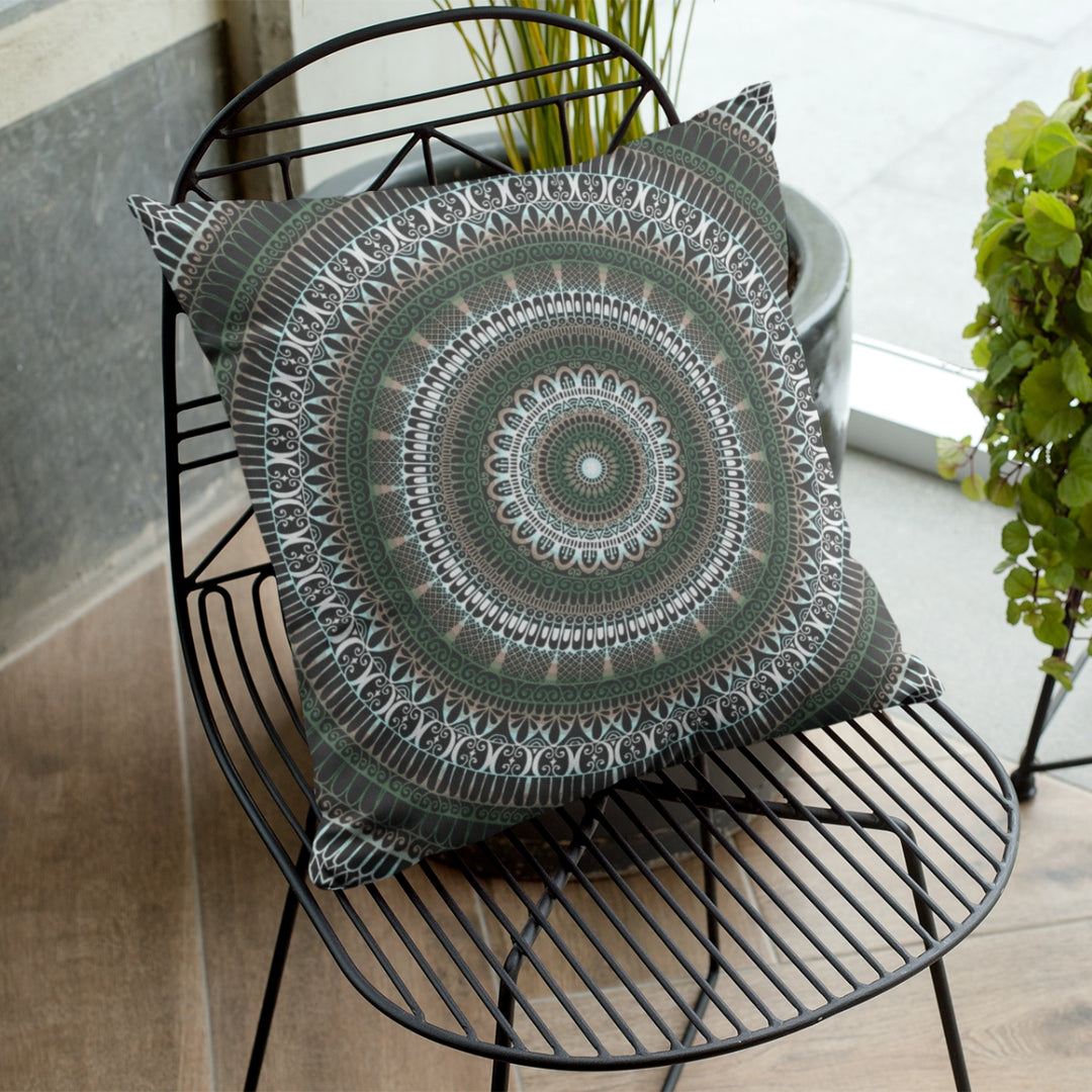 A serene and nature-inspired mandala throw pillow named 'Enchanted Forest: Mandala Throw Pillow in Serene Green,' exuding the charm of the forest and a sense of tranquility through its design.